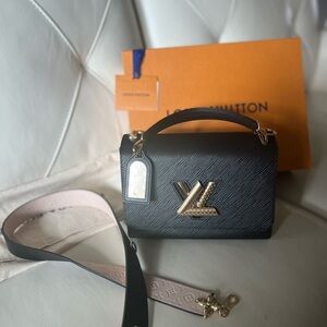 SOLD.     Authentic - JUST RELEASED - Dual Strap Twist MM.